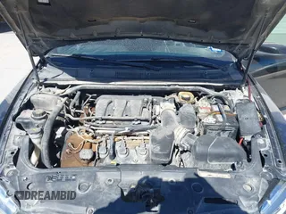 2014 Ford Taurus SEL with VIN 1FAHP2E83EG184976, listed as a IAAI auction lot 41590153 with 177,342 mi miles. Bid and sale history available at carsss.com. Image 10.