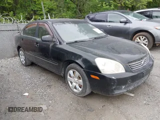2008 Kia Optima LX z VIN KNAGE123885235142, wystawiony jako IAAI lot #42112119 z przebiegiem 145 410 mil mil oraz . Historia ofert i sprzedaży dostępna na DreamBid. Obrazek 1.