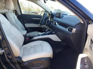 2021 Mazda CX-5 Grand Touring with VIN JM3KFADM5M0428279, listed as a IAAI auction lot 41747175 with 49,579 mi miles. Bid and sale history available at carsss.com. Image 5.