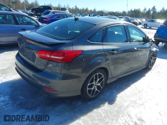 2016 Ford Focus SE with VIN 1FADP3F26GL223603, listed as a IAAI auction lot 41492481 with 146,012 mi miles. Bid and sale history available at carsss.com. Image 4.