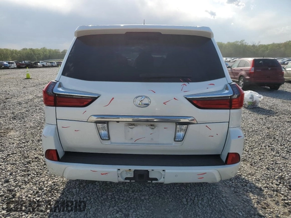 2016 Lexus LX 570 with VIN JTJHY7AX3G4191641, listed as a Copart auction lot 52580875 with 122,950 mi miles and Salvage Title. Bid and sale history available at DreamBid. Image 6.
