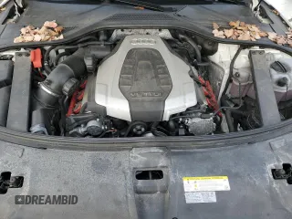 2015 Audi A8 z VIN WAUJGAFD9FN003570, wystawiony jako Copart lot #87642905 z przebiegiem 71 523 mil mil oraz Czysty tytuł • Clean title. Historia ofert i sprzedaży dostępna na DreamBid. Obrazek 11.