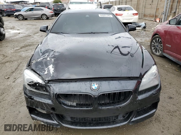 2014 BMW 6 Series 650i z VIN WBA6B2C5XED128959, wystawiony jako Copart lot #44201745 z przebiegiem 146 875 mil mil oraz Szkoda całkowita • Salvage title. Historia ofert i sprzedaży dostępna na DreamBid. Obrazek 5.