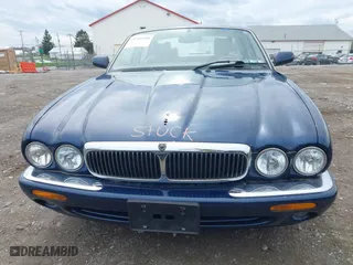 1998 Jaguar XJ with VIN SAJHX124XWC844575, listed as a IAAI auction lot 41951600 with 97,458 mi miles. Bid and sale history available at carsss.com. Image 6.