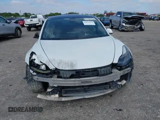 2021 Tesla Model 3 Performance z VIN 5YJ3E1EC5MF984891, wystawiony jako IAAI lot #42071151 z przebiegiem 72 883 mil mil oraz . Historia ofert i sprzedaży dostępna na DreamBid. Obrazek 6.