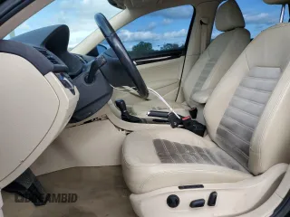 2014 Volkswagen Passat SEL Premium z VIN 1VWCN7A34EC066375, wystawiony jako Copart lot #54016005 z przebiegiem 170 305 mil mil oraz Szkoda całkowita • Salvage title. Historia ofert i sprzedaży dostępna na DreamBid. Obrazek 7.