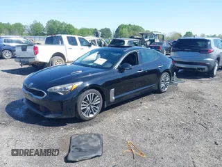 2018 Kia Stinger Premium z VIN KNAE25LA7J6012188, wystawiony jako IAAI lot #41984591 z przebiegiem 106 165 mil mil oraz . Historia ofert i sprzedaży dostępna na DreamBid. Obrazek 2.