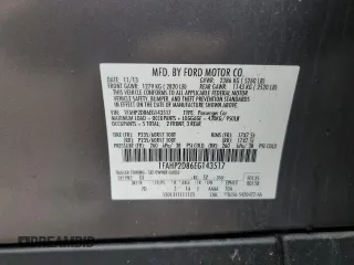 2014 Ford Taurus SE z VIN 1FAHP2D86EG143517, wystawiony jako Copart lot #51066975 z przebiegiem 134 892 mil mil oraz Szkoda całkowita • Salvage title. Historia ofert i sprzedaży dostępna na DreamBid. Obrazek 14.