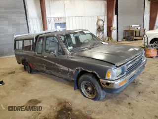 1992 Toyota Pickup DLX z VIN JT4RN93P0N5065687, wystawiony jako Copart lot #56355125 z przebiegiem 215 019 mil mil oraz Czysty tytuł • Clean title. Historia ofert i sprzedaży dostępna na DreamBid. Obrazek 4.