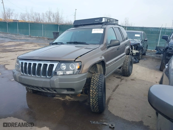 2002 Jeep Grand Cherokee Laredo with VIN 1J4GW48N12C193792, listed as a IAAI auction lot 41545283 with 166,720 mi miles. Bid and sale history available at carsss.com. Image 2.