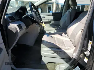 2014 Honda Odyssey Touring with VIN 5FNRL5H99EB088859, listed as a Copart auction lot 54828555 with 147,147 mi miles and Salvage Title. Bid and sale history available at DreamBid. Image 7.
