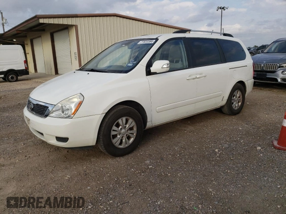 2012 Kia Sedona LX with VIN KNDMG4C79C6502438, listed as a Copart auction lot 77833384 with 169,459 mi miles and Clean Title. Bid and sale history available at carsss.com. Image 1.