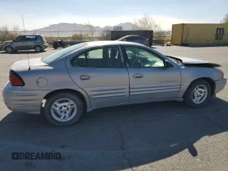 1999 Pontiac Grand Am SE2 with VIN 1G2NE52E5XM826878, listed as a Copart auction lot 77351164 with 241,463 mi miles and Salvage Title. Bid and sale history available at carsss.com. Image 3.