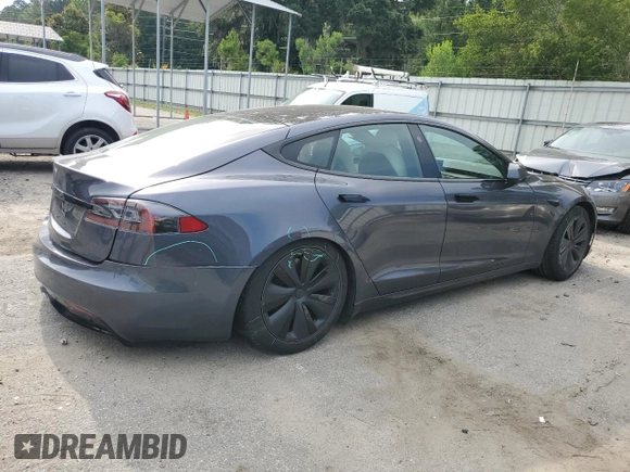 2022 Tesla Model S with VIN 5YJSA1E5XNF471212, listed as a Copart auction lot 57384025 with Not provided miles and Salvage title. Bid and sale history available at DreamBid. Image 3.