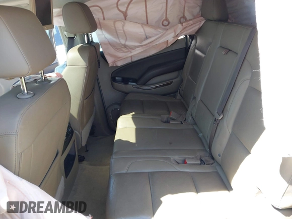 2017 Chevrolet Suburban LT z VIN 1GNSKHKC9HR268651, wystawiony jako IAAI lot #42125406 z przebiegiem 174 451 mil mil oraz . Historia ofert i sprzedaży dostępna na DreamBid. Obrazek 8.