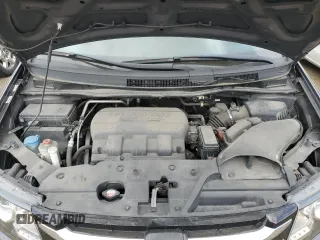 2015 Honda Odyssey Touring Elite z VIN 5FNRL5H96FB047204, wystawiony jako Copart lot #56297985 z przebiegiem 125 482 mil mil oraz Szkoda całkowita • Salvage title. Historia ofert i sprzedaży dostępna na DreamBid. Obrazek 12.
