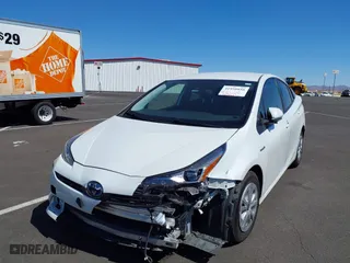 2021 Toyota Prius L Eco with VIN JTDKAMFU9M3133528, listed as a IAAI auction lot 41950856 with 138,787 mi miles. Bid and sale history available at carsss.com. Image 6.