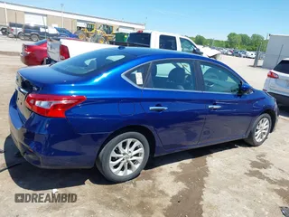 2018 Nissan Sentra SV z VIN 3N1AB7APXJY266879, wystawiony jako IAAI lot #42106571 z przebiegiem 140 050 mil mil oraz . Historia ofert i sprzedaży dostępna na DreamBid. Obrazek 14.