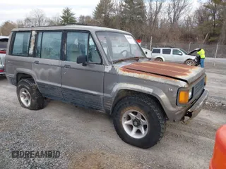 1990 Isuzu Trooper z VIN JACCH58R0L8900522, wystawiony jako IAAI lot #41642808 z przebiegiem 177 690 mil mil oraz . Historia ofert i sprzedaży dostępna na DreamBid. Obrazek 1.