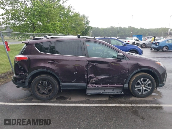 2018 Toyota RAV4 LE with VIN 2T3BFREV9JW857284, listed as a IAAI auction lot 42448480 with 85,551 mi miles and . Bid and sale history available at DreamBid. Image 13.