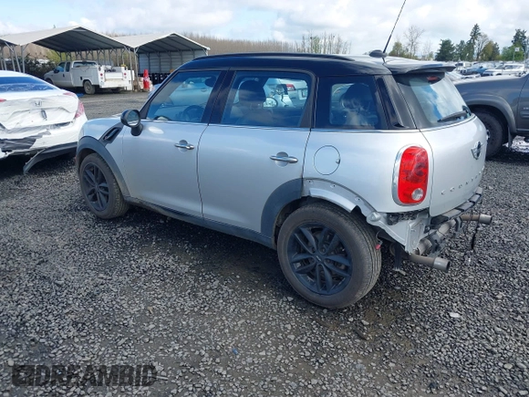 2014 MINI Countryman S with VIN WMWZC3C56EWP26003, listed as a IAAI auction lot 41884630 with 101,683 mi miles and . Bid and sale history available at DreamBid. Image 3.