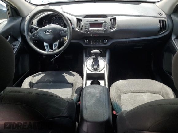 2012 Kia Sportage LX z VIN KNDPB3A29C7240993, wystawiony jako Copart lot #61408165 z przebiegiem 171 453 mil mil oraz Czysty tytuł • Clean title. Historia ofert i sprzedaży dostępna na DreamBid. Obrazek 8.