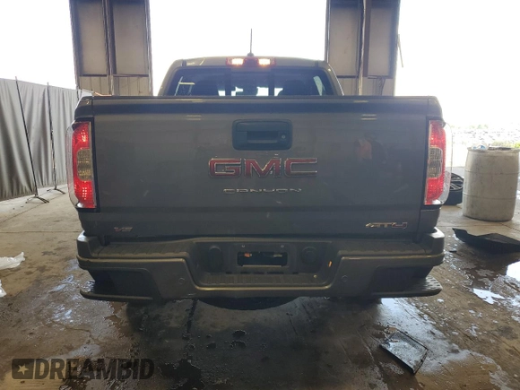 2022 GMC Canyon 4WD AT4 z VIN 1GTG6FEN0N1162393, wystawiony jako Copart lot #55286065 z przebiegiem 55 185 mil mil oraz Szkoda całkowita • Salvage title. Historia ofert i sprzedaży dostępna na DreamBid. Obrazek 6.