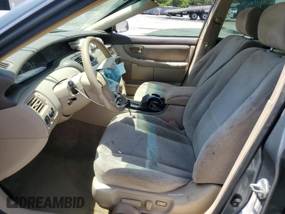 2000 Toyota Avalon XL с VIN 4T1BF28B6YU104579, выставлен на аукционе Copart как лот 54129515 с пробегом 145 273 миль миль и Списание • Salvage title. История ставок и продаж доступна на DreamBid. Изображение 7.