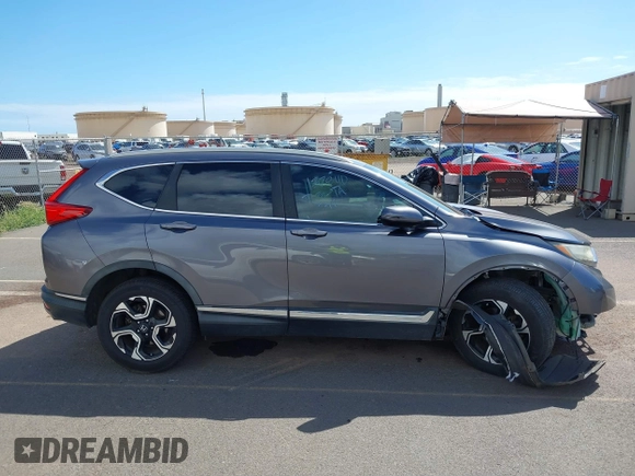2018 Honda CR-V Touring with VIN 7FARW1H90JE030766, listed as a IAAI auction lot 41637900 with Not Provided miles and . Bid and sale history available at DreamBid. Image 13.
