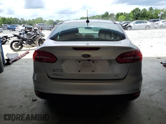 2017 Ford Focus SE with VIN 1FADP3F21HL258115, listed as a Copart auction lot 60151275 with 42,450 mi miles and Salvage title. Bid and sale history available at DreamBid. Image 6.