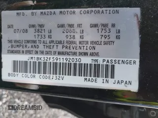 2009 Mazda 3 i Touring Value with VIN JM1BK32F591192030, listed as a IAAI auction lot 41248304 with 153,467 mi miles. Bid and sale history available at carsss.com. Image 9.