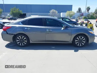 2017 Nissan Altima S z VIN 1N4AL3AP4HC271765, wystawiony jako IAAI lot #41968905 z przebiegiem 106 621 mil mil oraz . Historia ofert i sprzedaży dostępna na DreamBid. Obrazek 14.