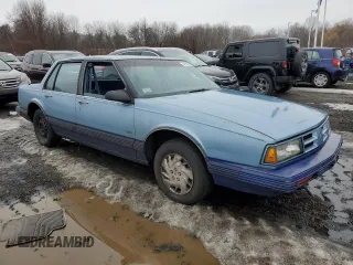 1991 Oldsmobile Delta z VIN 1G3HN54C3M1807067, wystawiony jako Copart lot #46126225 z przebiegiem 192 687 mil mil oraz Szkody całkowita. Historia ofert i sprzedaży dostępna na DreamBid. Obrazek 4.