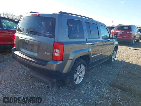 2013 Jeep Patriot Latitude with VIN 1C4NJPFA1DD169521, listed as a IAAI auction lot 41812936 with 133,088 mi miles. Bid and sale history available at carsss.com. Image 4.