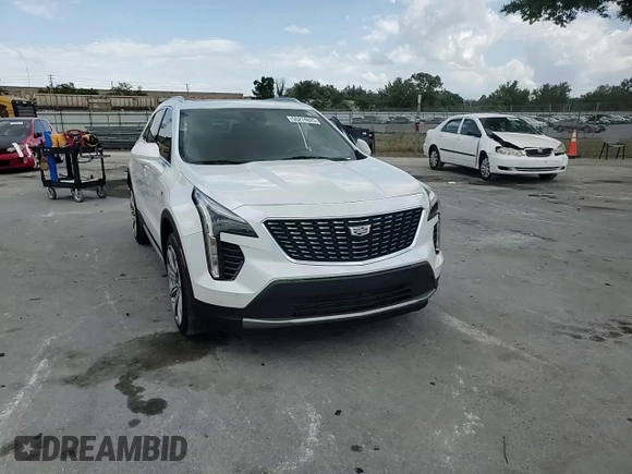 2020 Cadillac XT4 FWD Premium Luxury z VIN 1GYFZCR4XLF005029, wystawiony jako Copart lot #55274025 z przebiegiem 50 550 mil mil oraz Szkoda całkowita • Salvage title. Historia ofert i sprzedaży dostępna na DreamBid. Obrazek 14.