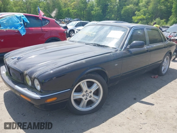 1999 Jaguar XJ with VIN SAJPX1841XC864072, listed as a IAAI auction lot 42176220 with 122,712 mi miles and . Bid and sale history available at DreamBid. Image 2.