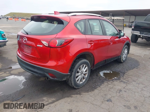 2015 Mazda CX-5 Sport z VIN JM3KE2BE9F0452625, wystawiony jako IAAI lot #42114867 z przebiegiem 167 849 mil mil oraz . Historia ofert i sprzedaży dostępna na DreamBid. Obrazek 4.