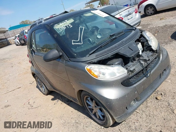 2009 Smart fortwo Pure z VIN WMEEJ31X99K302227, wystawiony jako IAAI lot #41900573 z przebiegiem 30 730 mil mil oraz . Historia ofert i sprzedaży dostępna na DreamBid. Obrazek 1.