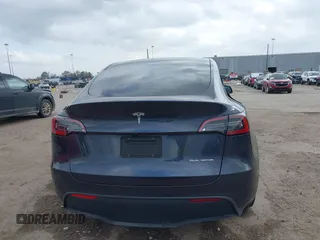 2024 Tesla Model Y Long Range with VIN 7SAYGDEE0RA261489, listed as a IAAI auction lot 41729325 with 5,060 mi miles. Bid and sale history available at carsss.com. Image 16.
