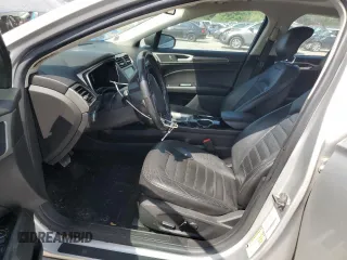 2013 Ford Fusion SE Hybrid z VIN 3FA6P0LU3DR336838, wystawiony jako Copart lot #56205445 z przebiegiem 209 164 mil mil oraz Czysty tytuł • Clean title. Historia ofert i sprzedaży dostępna na DreamBid. Obrazek 7.