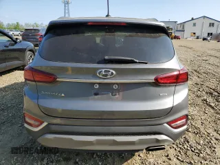 2019 Hyundai Santa Fe SE z VIN 5NMS2CAD2KH130516, wystawiony jako Copart lot #55349435 z przebiegiem 63 760 mil mil oraz Szkoda całkowita • Salvage title. Historia ofert i sprzedaży dostępna na DreamBid. Obrazek 6.