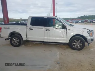 2019 Ford F-150 XL with VIN 1FTEW1E50KFA47687, listed as a IAAI auction lot 42021043 with 129,337 mi miles. Bid and sale history available at carsss.com. Image 13.