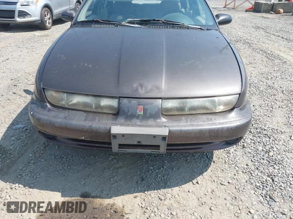 1999 Saturn SL with VIN 1G8ZK5272XZ225139, listed as a IAAI auction lot 42662628 with 223,692 mi miles and . Bid and sale history available at DreamBid. Image 6.