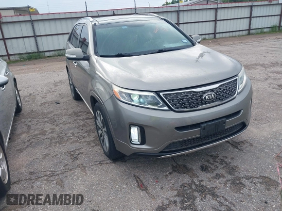 2014 Kia Sorento SX Limited with VIN 5XYKW4A73EG503792, listed as a IAAI auction lot 42684390 with 129,021 mi miles and . Bid and sale history available at DreamBid. Image 1.