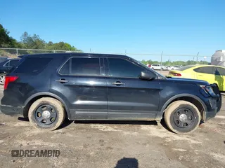 2019 Ford Police Interceptor Utility z VIN 1FM5K8AT0KGA31584, wystawiony jako IAAI lot #42011705 z przebiegiem 145 304 mil mil oraz . Historia ofert i sprzedaży dostępna na DreamBid. Obrazek 13.
