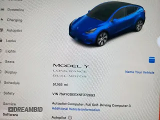 2022 Tesla Model Y Long Range z VIN 7SAYGDEEXNF372693, wystawiony jako Copart lot #53275555 z przebiegiem 51 165 mil mil oraz Szkody całkowita. Historia ofert i sprzedaży dostępna na DreamBid. Obrazek 9.