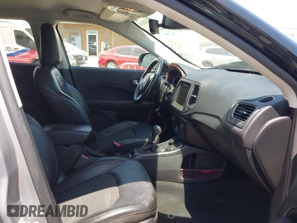 2020 Jeep Compass Trailhawk with VIN 3C4NJDDB7LT159532, listed as a IAAI auction lot 42243833 with 118,566 mi miles and . Bid and sale history available at DreamBid. Image 5.
