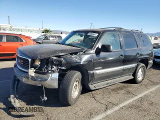 2001 GMC Yukon SLT with VIN 1GKEC13T41J148550, listed as a Copart auction lot 80580964 with 0 mi miles and Salvage Title. Bid and sale history available at carsss.com. Image 1.
