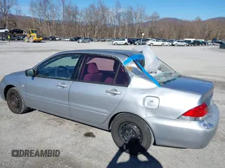 2004 Mitsubishi Lancer ES with VIN JA3AJ26E64U035168, listed as a IAAI auction lot 41625806 with 176,232 mi miles. Bid and sale history available at carsss.com. Image 6.