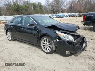 2014 Toyota Avalon Limited with VIN 4T1BK1EB5EU134727, listed as a Copart auction lot 49963195 with 57,083 mi miles and Salvage Title. Bid and sale history available at carsss.com. Image 4.